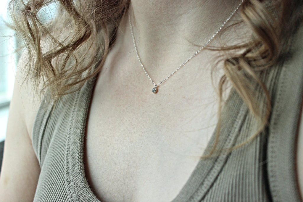 Lumen Diamond Solitaire Necklace | A handcrafted diamond solitaire necklace designed around simplicity, light, and everyday wear.